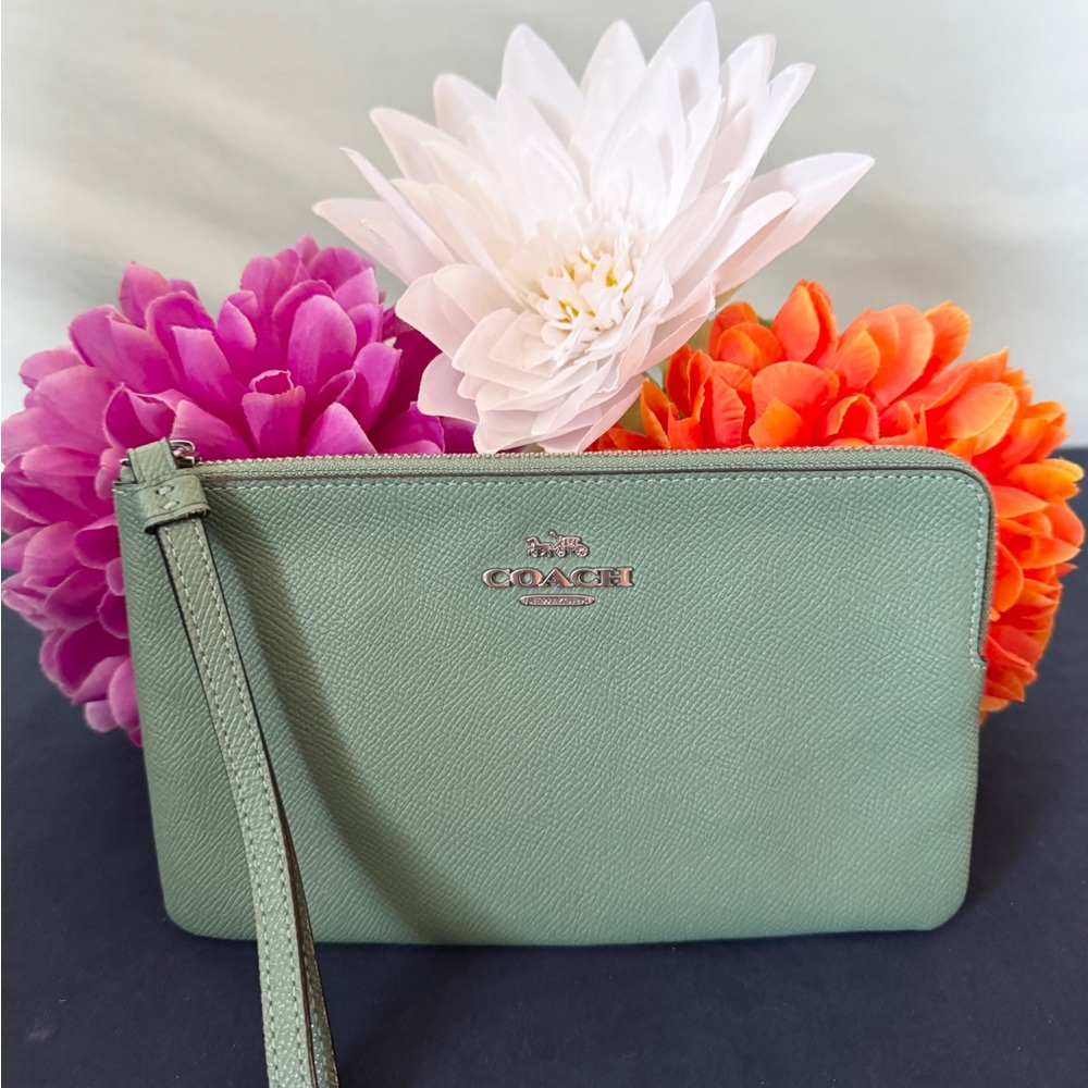 Coach EUC larger leather corner zip wristlet
